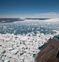 This is a view down the Ilulissat Fjord toward the terminus where Jakobshavn Isbrae rapidly discharges ice to the ocean.  This fjord is frequently clogged with icebergs along its entire 60-km  (37 mile) length.