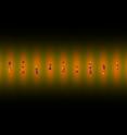 This shows the lattice of laser beams traps small numbers of ytterbium atoms in pancake-shaped "wells." A yellow laser excites the atoms so that they switch between lower (blue) and higher (yellow) energy levels.