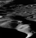 This is a view from NASA's Lunar Reconnaissance Orbiter spacecraft across the north rim of Cabeus crater. The leaping dust behavior may be observed on the moon in places like this where sunlit areas are close to shaded regions.