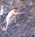 Researchers Chris Reinhard (front) and Noah Planavsky dig into a shale exposure in north China.