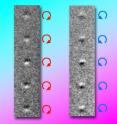 Magnetic transmission soft x-ray microscopy shows the reverse of spin circularity in magnetic vortices in a row of nanodisks, after applying a 1.5 nanosecond pulse of magnetic field. The change from left to right is not a change in lighting, as it may appear, but is instead due to changing magnetic contrast.