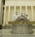 This photograph shows the SMAP propellant tank after installation at NASA's Jet Propulsion Laboratory in Pasadena, Calif. The propulsion tank was made by ATK Space Systems in Commerce, Calif. The technicians and engineers pictured are (left to right) John Shuping, Ryan Van Schilfgaarde, Bob Path and Vinh Dang.