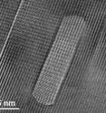 Researchers at NC State University used high-resolution transmission electron microscopy to simultaneously irradiate magnesium and collect images of voids forming in the material.