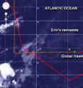 This infrared image from NOAA's GOES-East satellite on Aug. 20 shows the Global Hawk crossing the low-level remnants of Erin. Erin's low-level clouds appear as a faint circulation. The green path is the direction the Global Hawk came from. The red line represents the path the aircraft would follow.