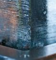 This image shows an ice core sample melting on a continuous system inside the ultra-trace ice core analytical laboratory at the Desert Research Institute in Reno, Nevada.