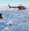 Penn State graduate student Kiya Riverman conducts seismic fieldwork on the floating section of Pine Island Glacier.