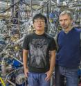 Eryin Wang (left) and Alexei Fedorov are at ALS Beamline 12.0.1 where the induced high temperature superconductivity in a topological insulator was confirmed.