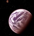 KOI-314c, shown in this artist's conception, is the lightest planet to have both its mass and physical size measured. Surprisingly, although the planet weighs the same as Earth, it is 60 percent larger in diameter, meaning that it must have a very thick, gaseous atmosphere. It orbits a dim, red dwarf star (shown at left) about 200 light-years from Earth. KOI-314c interacts gravitationally with another planet, KOI-314b (shown in the background), causing transit timing variations that allow astronomers to measure the masses of both worlds. This serendipitous discovery resulted from analysis as part of the Hunt for Exomoons with Kepler (HEK) project.