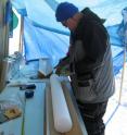 South Dakota State University's Jihong Cole-Dai is logging an ice-core sample at Summit, Greenland.