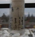 This is a piece of the GISP2 ice core showing silt and sand embedded in ice.  Soon after this picture was taken, the ice was crushed in the University of Vermont clean lab and the sediment was isolated for analysis.