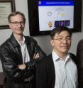 This image shows University of Illinois faculty members, including Roger Adams Professor of Chemistry Steven C. Zimmerman (left), with Associate Professor of Chemical and Biomolecular Engineering Hyunjoon Kong, and graduate student Cartney Smith.