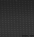 This is a scanning electron microscope image of nickel islands on silicon protected by a titanium dioxide film.
