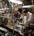 SLAC researchers Spencer Gessner, left, and Sebastien Corde monitor pairs of electron bunches sent into a plasma inside an oven of hot lithium gas at the Facility for Advanced Accelerator Experimental Tests (FACET). They are part of a team whose findings show that this electron acceleration technique, known as plasma wakefield acceleration, is powerful enough and efficient enough to drive a new generation of compact particle accelerators.