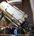 The University of Toledo observing team poses with the HPOL instrument (far right) mounted on the Ritter Observatory 1-m telescope. Graduate and undergraduate students in the Department of Physics & Astronomy conduct observations with HPOL every clear night.