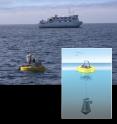 This is a photograph and diagram of the free-drifting Environmental Sample Processor (ESP), a robotic molecular biology laboratory developed by the Monterey Bay Aquarium Research Institute (MBARI). In the background is MBARI's research vessel Western Flyer, which tracked the ESP as it drifted with the currents in Monterey Bay. The ESP automatically collected and preserved samples of RNA every four hours, allowing researchers to track the daily activities of marine microbes in unprecedented detail.