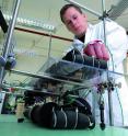 acib researcher Nikolaus Hammerschmidt is shown working at a continuous reactor in lab scale.