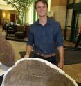 Evan Saitta, an M.Sc. student at the University of Bristol, UK at Billings Clinic in Montana with a <i>Stegosaurus</i> plate scanned at the hospital.  Evan's recent study of the iconic dinosaur, published in <i>PLOS ONE</i>, provides the first convincing evidence for sexual differences in a species of dinosaur.