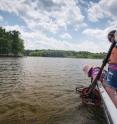 In New Hampshire's Great Bay, a team of UNH undergraduate and graduate students collect oysters to look at environmental conditions that might favor <i>V. parahaemolyticus</i>.