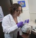 Sarah Laszlo, an assistant professor of Psychology, is photographed at her laboratory in Science IV.