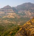 These are layered lava flows of the Deccan Traps east of Mumbai, India.