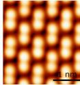 Methylammonium molecules (represented by a ball-and-stick model in the centre) in  methylammonium lead bromide (CH3NH3PbBr3) can rotate. They favour specific orientations that lead to two types of surface structures with distinctly different properties (left and right images).