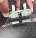 This is a small handheld gecko grippers and associated test hardware.