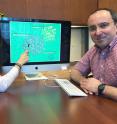 Georgia Tech Doctoral Student Maria Juliana Soto-Gir&oacute;n and School of Civil and Environmental Engineering Professor Kostas Konstantinidis are shown with images of bacteria. Research done with scientists from the US Environmental Protection Agency documented bacteria in shower hoses taken from hospital patient rooms.