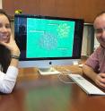 Georgia Tech Doctoral Student Maria Juliana Soto-Gir&oacute;n and School of Civil and Environmental Engineering Professor Kostas Konstantinidis are shown with images of bacteria. Research done with scientists from the US Environmental Protection Agency documented bacteria in shower hoses taken from hospital patient rooms.