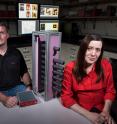 Georgia Tech Graduate Student Paul Rose and Assistant Professor Anna Erickson are shown with Cherenkov quartz detectors used to image shielded radioactive materials inside cargo containers.