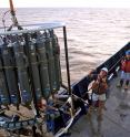 The University of Georgia's Patricia Yager, center, oversees ocean sampling equipment on board the RV Atlantis before it's lowered into the Amazon River plume.