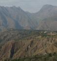 anoramic photograph looking west of the Riasi fault system. For scale, an elevation of 300 m separates an older river terrace, the Bidda terrace, to the modern Chenab River.