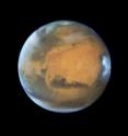 This image shows our neighboring planet Mars, as it was observed shortly before opposition in 2016 by the NASA/ESA Hubble Space Telescope.
<P>
Some prominent features of the planet are clearly visible: the ancient and inactive shield volcano Syrtis Major; the bright and oval Hellas Planitia basin; the heavily eroded Arabia Terra in the centre of the image; the dark features of Sinus Sabaeous and Sinus Meridiani along the equator; and the small southern polar cap.