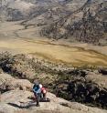 University of Wyoming researchers Davin Bagdonas and Carol Frost make observations on Lankin Dome, part of the Wyoming batholith, in central Wyoming's Granite Mountains.