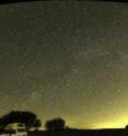 The Milky Way dissappears in Berlin's light-dome.