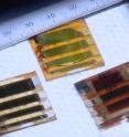 Three types of large-area solar cells are made out of two-dimensional perovskites.  At left, a room-temperature cast film; upper middle is a sample with the problematic band gap, and at right is the hot-cast sample with the best energy performance.