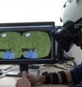 This is a screen grab from a video summarizing the experiment shows a patient learning to use an avatar to walk in virtual reality.
