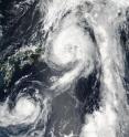 NASA-NOAA's Suomi NPP satellite captured this visible image of Tropical Storm Lionrock (bottom left) and Mindulle (top right) Aug. 21 at 11:45 p.m. EDT (0345 UTC on Aug. 22) near Japan.