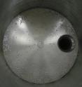 The researchers filled a cylindrical bucket with glass beads and measured the force required to lift the beads.