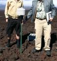 Steve Ryan and Kevin Hamilton inspect one of the atmospheric pressure sensors at the Mauna Loa Observatory. Steve Ryan and Kevin Hamilton inspect one of the atmospheric pressure sensors at the Mauna Loa Observatory.