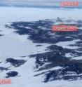 This is an Antarctic overview taken December 2008 showing Ace Lake in the center with the Long Fjord (marked by the red shelter) that connects to the ocean in the foreground, and the main Southern Ocean with icebergs in the background. This is an Antarctic overview taken December 2008 showing Ace Lake in the center with the Long Fjord (marked by the red shelter) that connects to the ocean in the foreground, and the main Southern Ocean with icebergs in the background.