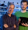 Stanford computer science professor Marc Levoy and graduate student Andrew Adams with their open-source source camera. Anyone will be able to create new features for the camera by writing aps that control all the camera's functions -- focus, exposure, shutter speed, flash, etc. Cameras could be taught new tricks with downloadable apps, analogous to iPhone apps. Stanford computer science professor Marc Levoy and graduate student Andrew Adams with their open-source source camera. Anyone will be able to create new features for the camera by writing aps that control all the camera's functions -- focus, exposure, shutter speed, flash, etc. Cameras could be taught new tricks with downloadable apps, analogous to iPhone apps.