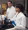 Byron Brehm-Stecher, assistant professor of food science and human nutrition, and master's student Brittany Porter work on a new process that can give fast, DNA-based information when Salmonella outbreaks occur.