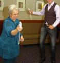 Project leader Eelke Folmer, right, plays VI Fit tennis with Frieda Aizenman in a demonstration, at the University of Nevada, Reno, of the exergame he and his team have developed with the idea of increasing physical activity for visually impaired children.