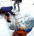 Personnel at NSF's Palmer Station on the Antarctic Peninsula conduct a glacier search-and-rescue drill that involves hauling a "victim" from a deep crevasse.