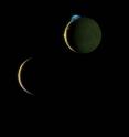 This is a composite image of Io and Europa taken March 2, 2007 with the New Horizons spacecraft. Here Io (top) steals the show with its beautiful display of volcanic activity. Three volcanic plumes are visible. Most conspicuous is the enormous 300-kilometer (190-mile) high plume from the Tvashtar volcano at the 11 o'clock position on Io's disk. Two much smaller plumes are also visible: that from the volcano Prometheus, at the 9 o'clock position on the edge of Io's disk, and from the volcano Amirani, seen between Prometheus and Tvashtar along Io's terminator (the line dividing day and night). The Tvashtar plume appears blue because of the scattering of light by tiny dust particles ejected by the volcanoes, similar to the blue appearance of smoke. In addition, the contrasting red glow of hot lava can be seen at the source of the Tvashtar plume. This image was taken from a range of 4.6 million kilometers (2.8 million miles) from Io and 3.8 million kilometers (2.4 million miles) from Europa. Although the moons appear close together in this view, a gulf of 790,000 kilometers (490,000 miles) separates them. Io's night side is lit up by light reflected from Jupiter, which is off the frame to the right. Europa's night side is dark, in contrast to Io, because this side of Europa faces away from Jupiter. This is a composite image of Io and Europa taken March 2, 2007 with the New Horizons spacecraft. Here Io (top) steals the show with its beautiful display of volcanic activity. Three volcanic plumes are visible. Most conspicuous is the enormous 300-kilometer (190-mile) high plume from the Tvashtar volcano at the 11 o'clock position on Io's disk. Two much smaller plumes are also visible: that from the volcano Prometheus, at the 9 o'clock position on the edge of Io's disk, and from the volcano Amirani, seen between Prometheus and Tvashtar along Io's terminator (the line dividing day and night). The Tvashtar plume appears blue because of the scattering of light by tiny dust particles ejected by the volcanoes, similar to the blue appearance of smoke. In addition, the contrasting red glow of hot lava can be seen at the source of the Tvashtar plume. This image was taken from a range of 4.6 million kilometers (2.8 million miles) from Io and 3.8 million kilometers (2.4 million miles) from Europa. Although the moons appear close together in this view, a gulf of 790,000 kilometers (490,000 miles) separates them. Io's night side is lit up by light reflected from Jupiter, which is off the frame to the right. Europa's night side is dark, in contrast to Io, because this side of Europa faces away from Jupiter.