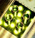 This is aphotograph of 1cm x 1cm optofluidic chip for direct detection of viral nucleic acids.