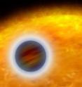 This is an artist's impression of a hot Jupiter. This is an artist's impression of a hot Jupiter.