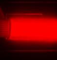 This image shows bright light emission from silicon quantum dots in a cuvette. The image is from a camera that captures the near-infrared light that the quantum dots emit. The light emission shown is a pseudo color, as near-infrared light does not fall in the visible spectrum. This image shows bright light emission from silicon quantum dots in a cuvette. The image is from a camera that captures the near-infrared light that the quantum dots emit. The light emission shown is a pseudo color, as near-infrared light does not fall in the visible spectrum.