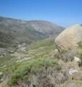 Jane Willenbring (upper right) takes samples to date a boulder in Spain's Bejar mountain range. Her findings helped show that ancient glaciers in the region reached their maximum size several thousands of years earlier than once believed.