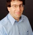 Dr. Joel Ray, a physician and researcher at St. Michael's Hospital in Toronto, has published a paper in the journal <i>Sociology Mind</i> that says check-cashing outlets may be strategically targeting persons who live in high-crime neighborhoods.